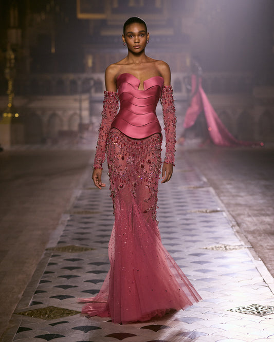 Rose pink couture gown with sculpted satin bodice, embellished long sleeves and a beaded tulle skirt.