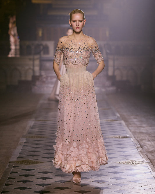 Blush pink couture set with crystal-embellished sheer jacket and matching embroidered long skirt.