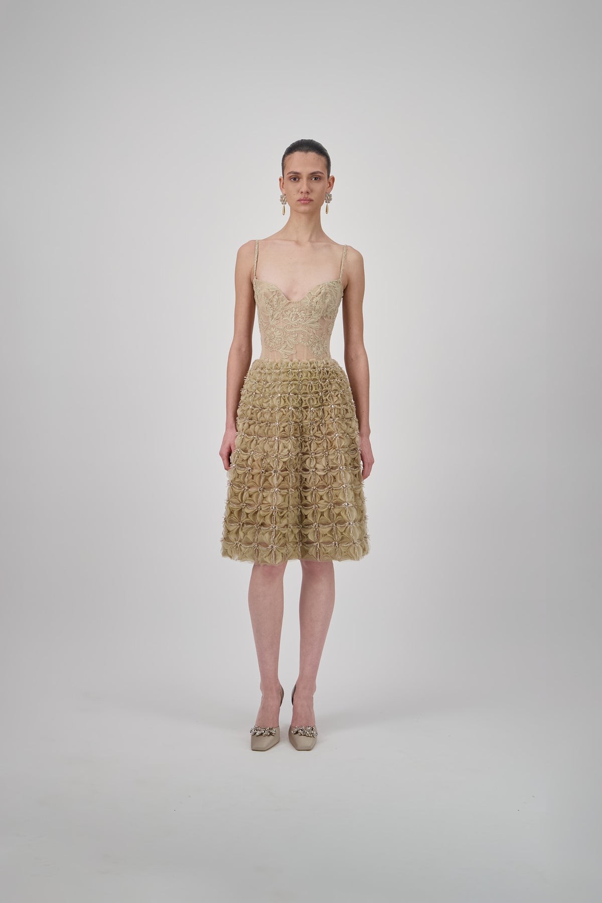 Rye Beige tulle short skirt with layered floral detailing, intricate beadwork and shimmering crystal embellishments.