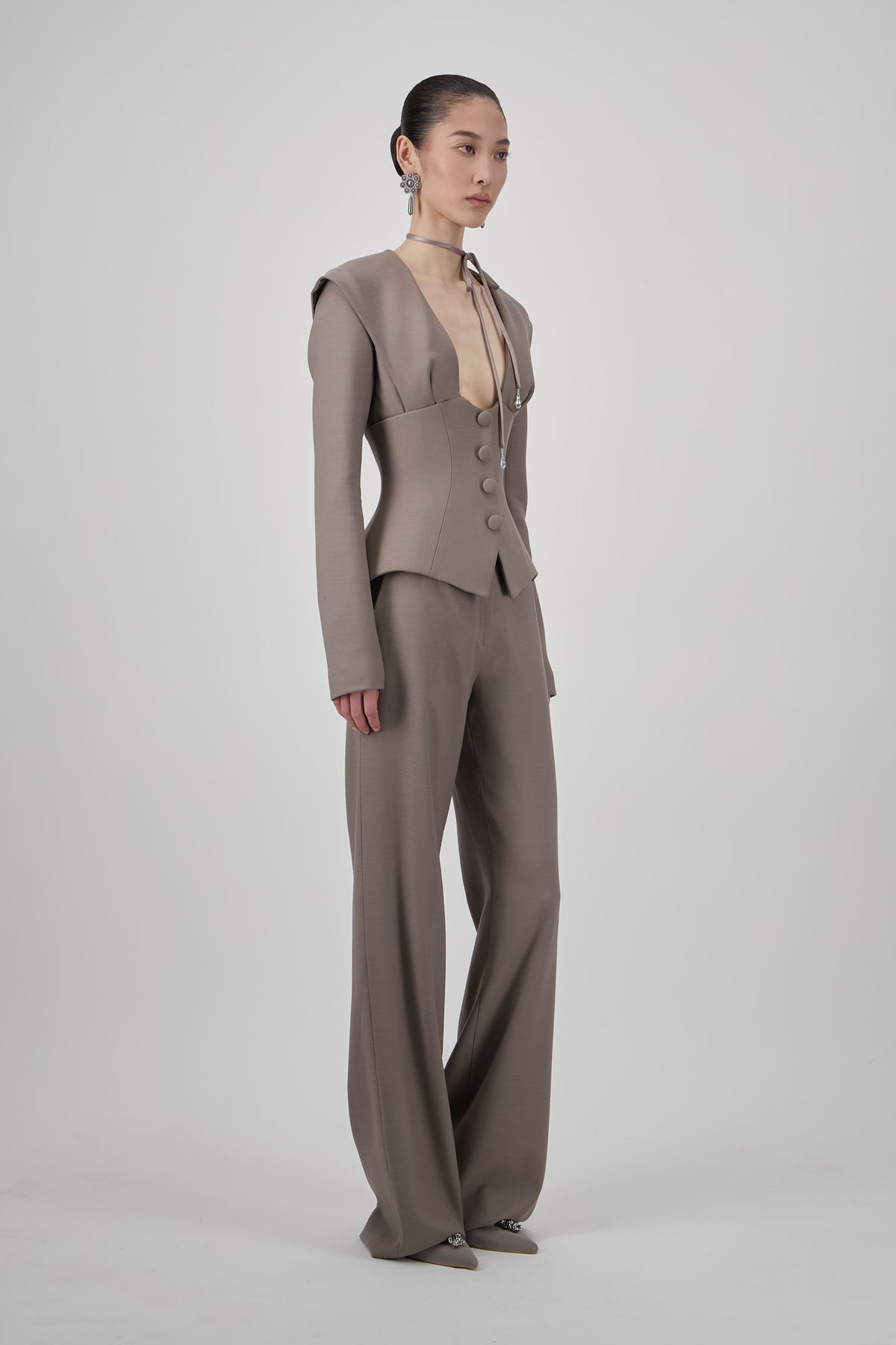 Tailored straight-leg pants with a clean waistline, fluid full-length silhouette and refined structured finish.